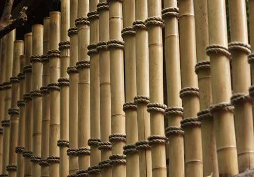 Bamboo fence posts tied to make some attractive bamboo fencing design